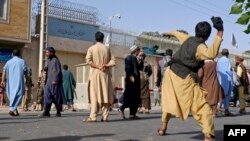 Afghan protesters pelted the Iranian Consulate in Herat with stones on April 11 and appeared to set fire to part of it. 