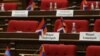 Armenia - Karabakh flags on the empty seats of opposition members of the Armenian parliament, April 12, 2022.