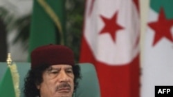 1969 елдан бирле Либиядә идарәдә утыручы Каддафи.