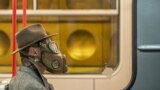 CZECH REPUBLIC -- A man wears a mask as he sits in the metro in Prague, March 17, 2020