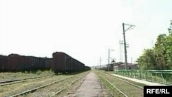 Train cars sit idle on a disused section of railway connecting Armenia and Turkey.