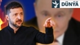 Ukrainanyň prezidenti Wolodymyr Zelenski (öňki planda) we Russiýanyň prezidenti Wladimir Putin (arkada). Illýustrasiýa suraty