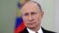 Russian President Vladimir Putin appearing in a video address to the nation published on the Kremlin website on March 16.