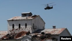 A Russian Ka-52 "Alligator" attack helicopter flies in Popasna