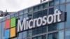 FILE - This April 12, 2016 file photo shows the Microsoft logo in Issy-les-Moulineaux, outside Paris, France. 