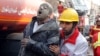 At Least 20 Firefighters Dead After Tehran Tower Collapse, Mayor Says