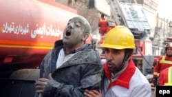 Firefighters Feared Dead After Tehran Tower Collapse