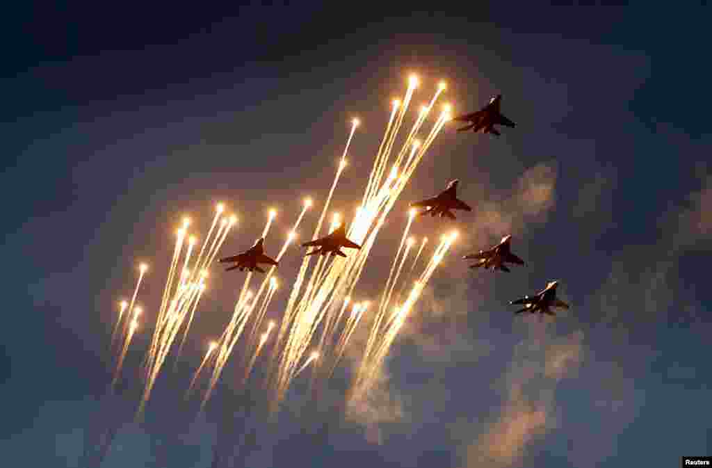 Belarusian MiG-29 jet fighters take part in a rehearsal for a military parade in Minsk. (Reuters/Vasily Fedosenko)