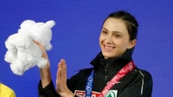 High jumper Maria Lasitskene receives her gold medal at the 2019 European Athletics Indoor Championships in Glasgow, Scotland, on March 3.