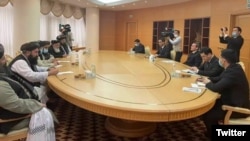 The Taliban delegation holding talks with Turkmen Foreign Minister Rashid Meredov (right) in Ashgabat on February 6