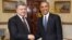 U.S. President Barack Obama greets Ukrainian President Petro Poroshenko at the Nuclear Security Summit in Washington on April 1.
