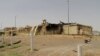 Damage at one side of a building is shown in this photo released by Iran after a fire or explosion at Natanz Nuclear Facility, Jully 2, 2020. 