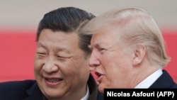 Kineski i američki predsednik Si Điping i Donald Tramp tokom susreta u novembru 2017.
