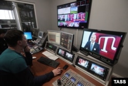 At the offices of ATR Crimean Tatar TV, before the closure