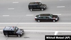 Vladimir Putin's motorcade travels through deserted Moscow streets on the way to the Russian president's inauguration in May 2012. 