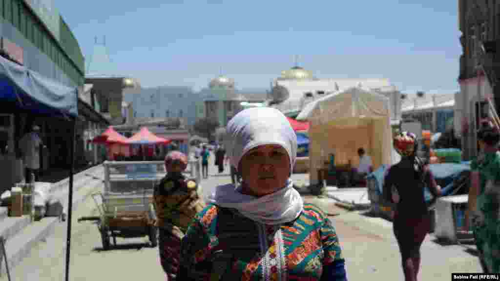 A woman on the street in Merv, Turkmenistan. June 16, 2014.