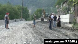 Armenia - A highway passing through Vahagnadzor village under construction.