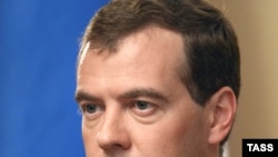 Russian President Dmitry Medvedev delivers his televised statement to the nation from Sochi.