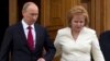 Russia -- President Vladimir Putin and his wife Lyudmila leave a church after an inauguration ceremony at the Cathedral Square in the Kremlin in Moscow, May 7, 2012