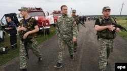 Губарєв у 2014-му в ролі «народного губернатора ДНР» відвідує місце збиття «Боїнга» МН17 під окупованим Сніжним