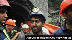 Coal miners react following an explosion in Golestan Province, in northern Iran on May 3.