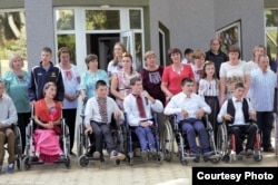 Beneficiari ai Centrului social Phoenix pentru persoane cu dizabilități și vârstnici de la Rîșcani.