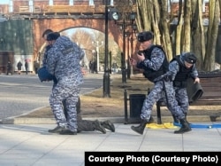 Within 20 minutes, four National Guard troops came and took Gorban away. He was charged with "discrediting the Russian armed forces."