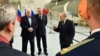 Vlagyimir Putyin és Aljakszandr Lukasenka a Roszkoszmosz főigazgatójával a Vosztocsnij űrrepülőtéren 2022. április 12-én