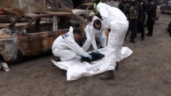 Medicii legiști ucraineni și francezi exhumă trupurile victimelor din Bucea