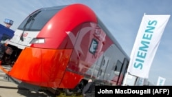 A Russian Railways Desiro train by Siemens is displayed at the Innotrans 2012 International Trade Fair for Transport and Mobility in Berlin in 2012.