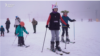 Ukrainian kids going skiing in Bulgaria Bansko resort refugees Masha and Dima, mother Elena