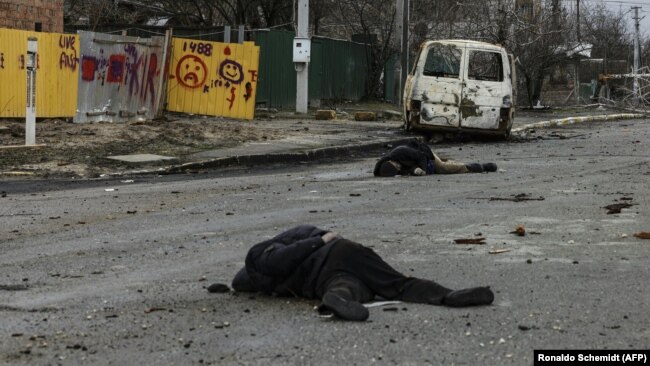 The bodies of civilians lie on a street in Bucha, northwest of Kyiv, on April 2 after Russian forces retreated.