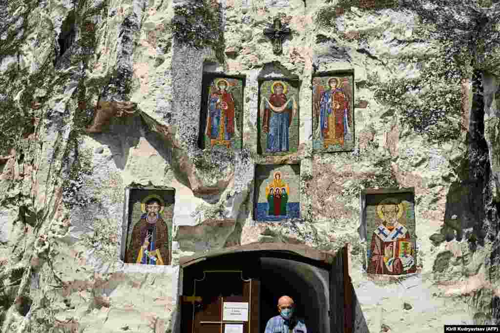 A man leaves the cathedral of a 17th-century monastery near the village of Kostomarovo in Russia&#39;s Voronezh region.&nbsp;