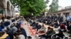 Bosnia-Herzegovina - Bosnian Muslims wearing face masks take part in the Eid Al-Adha prayer in front of Gazi-Husref Bey's mosque, in Sarajevo, on May 13, 2021.