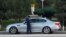 Turkmenistan. Policeman checking driver license. Car on the road. Ashgabat. October 2022 