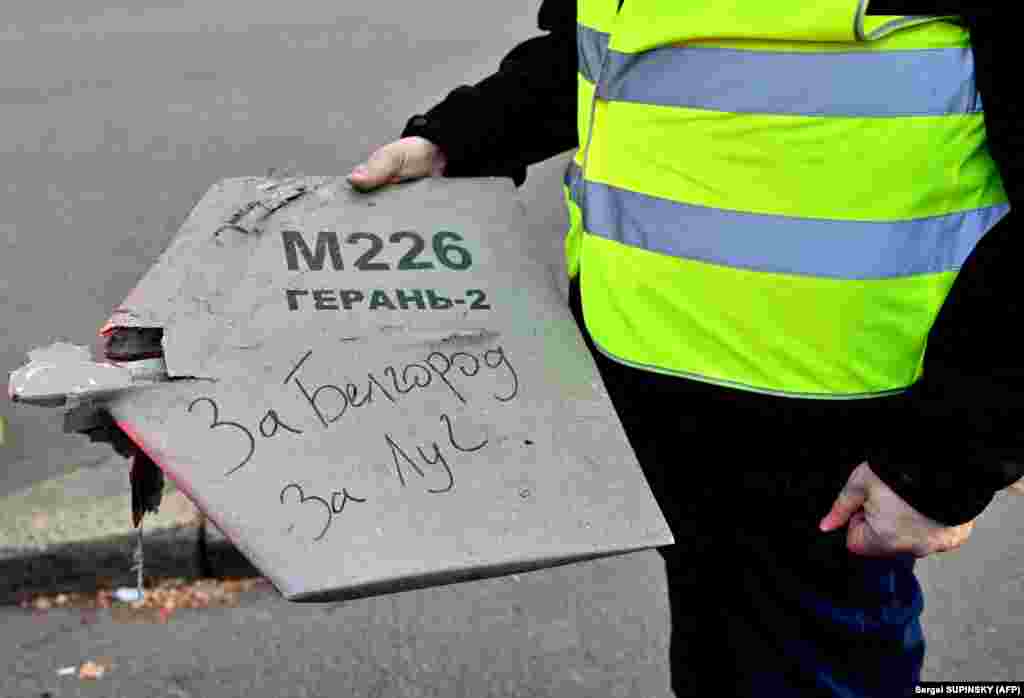 A police expert holds what authorities say is a fragment of a drone which purports to bear a handwritten inscription reading &ldquo;For Belgorod. For Luch.&rdquo; Russia has accused&nbsp;Ukraine&nbsp;of hitting targets in Belgorod region near the border. Pro-Russian news sources on the Telegram social media app reported that&nbsp;Ukraine&nbsp;had struck Belgorod&#39;s airport overnight.&nbsp;&nbsp;