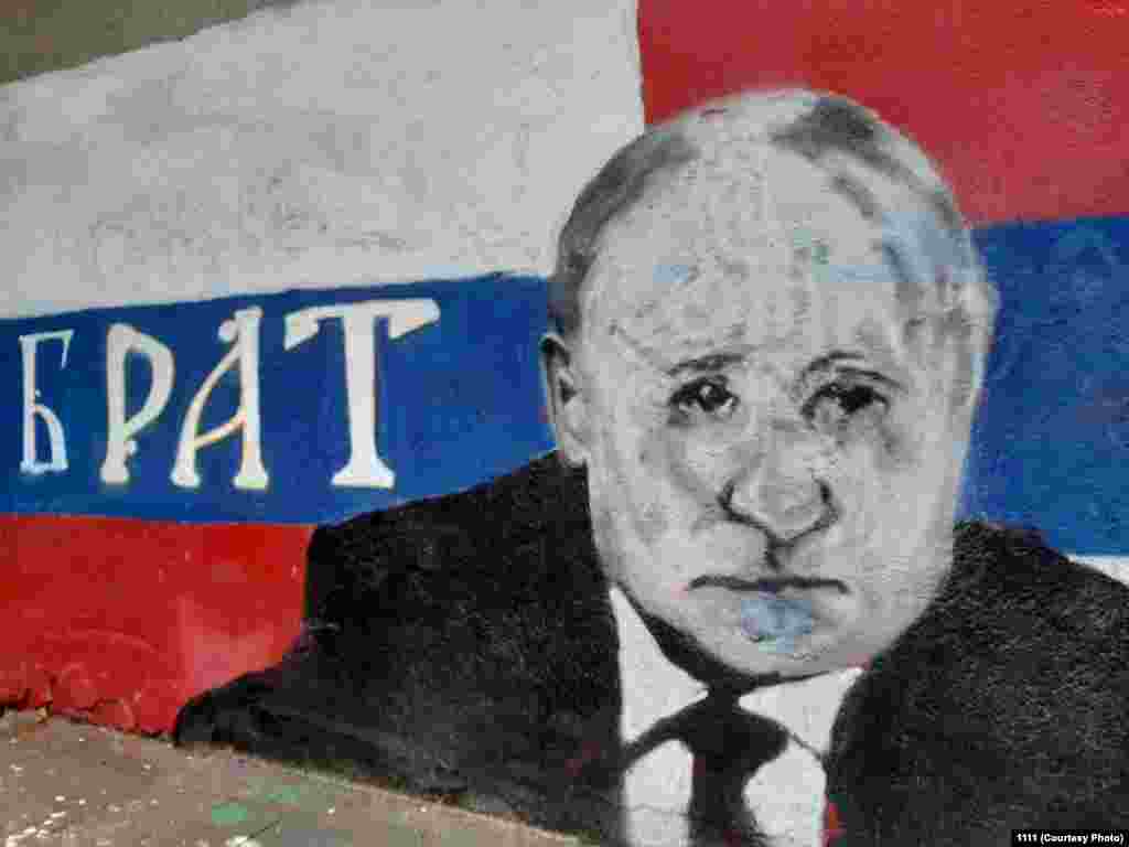 Pe 2 septembrie, portretul lui Putin a fost refăcut, aparent de un artist mai puțin priceput decât pictorul original.