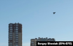 A Russian-launched Shahed-136 kamikaze drone is photographed moments before impact in central Kyiv on October 17.