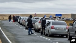 Many Russian men who fled Russia over the Ukraine mobilization went to Kazakhstan and other neighboring countries, often waiting in line for long periods to get across the border. (file photo)