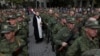 A priest blesses draftees called up in Russia's partial mobilization before their departure for Sevastopol, Crimea, on September 27, 2022.