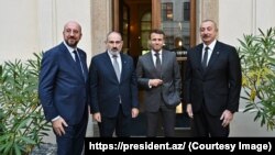 French President Emmanuel Macron (second from right) hosted a meeting in Prague last week with European Council President Charles Michel (left), bringing Azerbaijani President Ilham Aliyev (right) together with Armenian Prime Minister Nikol Pashinian.