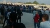 Iranian Oil Workers Strike, Raisi Heckled As Protests Enter Fourth Week video grab 1