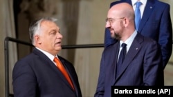 European Council President Charles Michel (right) and Hungarian Prime Minister Viktor Orban (file photo)