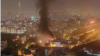Flames and smoke rising from Tehran's Evin prison were widely visible in the evening on October 15 as nationwide anti-government protests triggered by the death of Mahsa Amini entered a fifth week. 