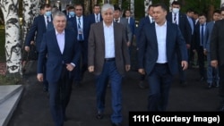 Uzbek President Shavkat Mirziyoev (left to right), Kazakh President Qasym-Zhomart Toqaev, and Kyrgyz President Sadyr Japarov arrive for talks at a Central Asia summit in Kyrgyzstan in July 2022.