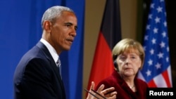 Американскиот претседател Барак Обама и германската канцеларка Ангела Меркел на заедничка прес-конференција во Берлин, 17 ноември 2016.
