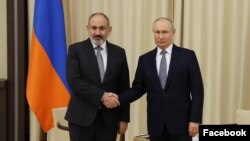 Russia - Russian President Vladimir Putin meets with Armenian Prime Minister Nikol Pashinian in his Novo-Ogaryovo residence outside Moscow, April 19, 2022.