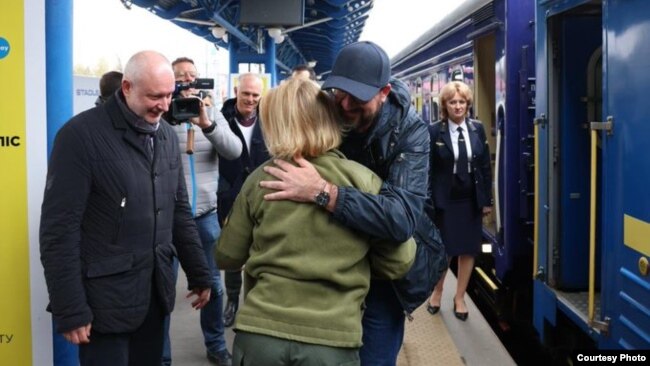 European Council President Charles Michel is greeted upon his arrival in Kyiv on April 20. 