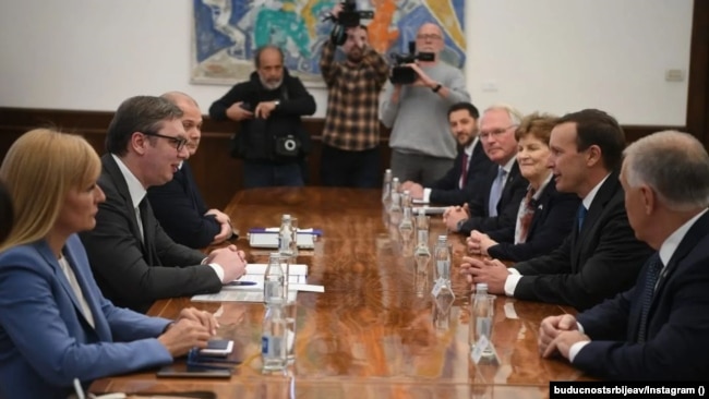 Serbian President Aleksandar Vucic (center left) speaks with U.S. senators Thom Tillis (first right), Chris Murphy (second right), and Jeanne Shaheen (third right) in Belgrade in April 19. 