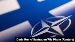 Logoja e NATO-s, fotografi ilustruese.